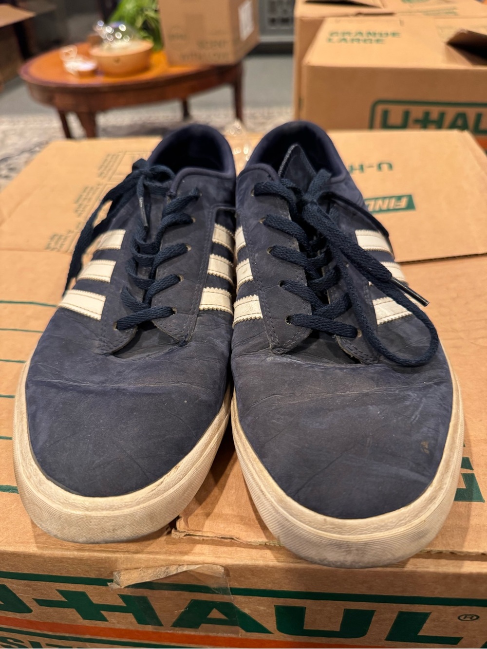 adidas navy athletic sneakers with white three-stripes